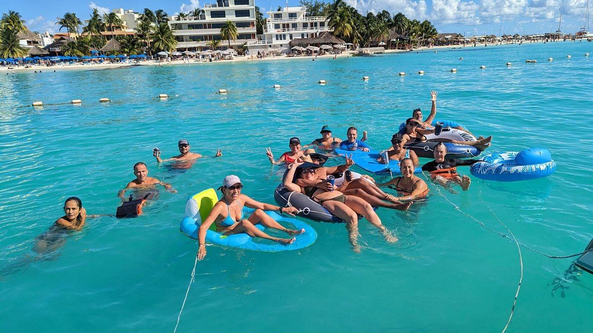 Guests swimming and floating in the Caribbean